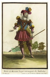 Dessin de Microton, représenté comme un homme habillé de toutes les couleurs et en tenue originale portant une lance dans la main gauche.